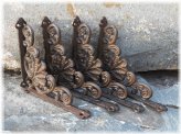 Shell-Embellished Cast Iron Shelf Brackets