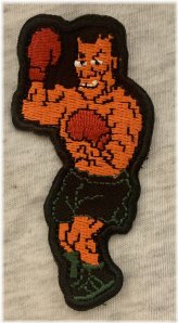 Tyson's Knockout Patch: 80s Retro Boxing Design for Video Game Collectors