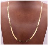 Golden Herringbone Elegance