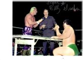 Legends Collide: Dual Signed Wrestling Photo with COA