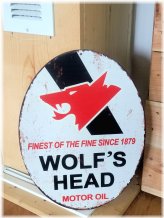 Retro Revival Metal Sign - Wolf's Head Oil & Gas Pump