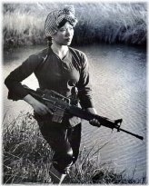Vietnam War Era Portrait: Female Viet Cong Warrior with M-16