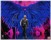 Entrance Wings Autographed Photo by Damian Priest