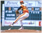 Rainbow Jersey Pitching Autographed Photo by Nolan Ryan