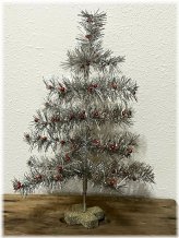 Silver Feathered Tinsel Tree with Red Ornaments