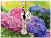 Pawprints in Time: A Pet Memorial Hourglass Necklace for Ashes