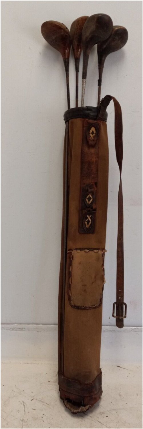 Antique Golf Set with Well-Worn Charm