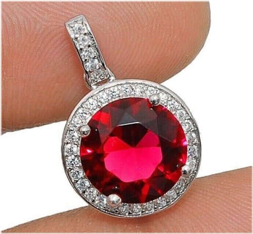 Elegant Ruby and Topaz Pendant in Sterling Silver