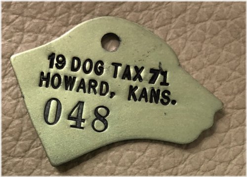 Howard Kansas 1971 Brass Dog Tag with Dog Head Image