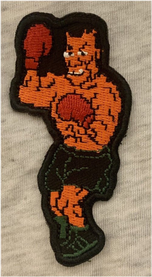 Tyson's Knockout Patch: 80s Retro Boxing Design for Video Game Collectors