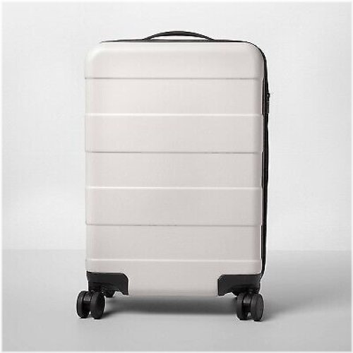 Tan Spinner Suitcase