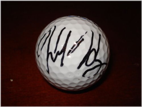 Hank Haney's Golf Ball Autographed by Tiger Woods' Swing Coach