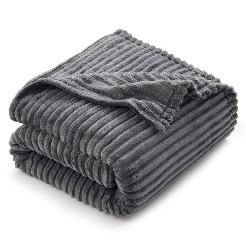 CozyCloud Fleece Throw: Your Ultimate Comfort Companion for Any Setting