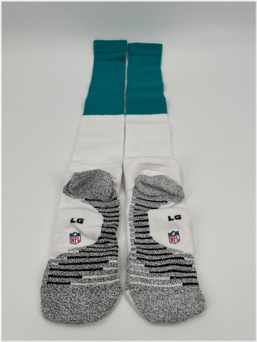 Aqua and White Nike Game Socks from the 2018 Miami Dolphins Season