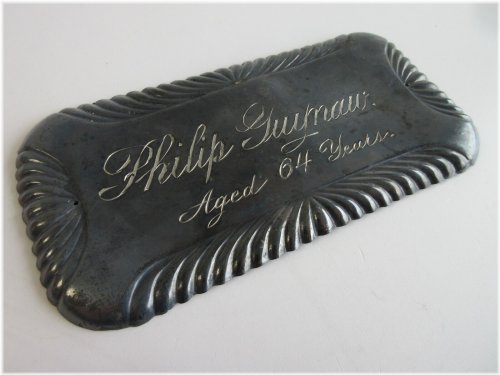 Eccentric Era Coffin Plate