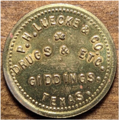 Luecke & Co. Drug Store Brass Token