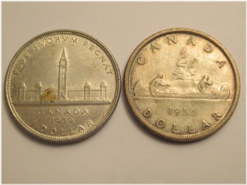 Dual Vintage Canadian Silver Dollars