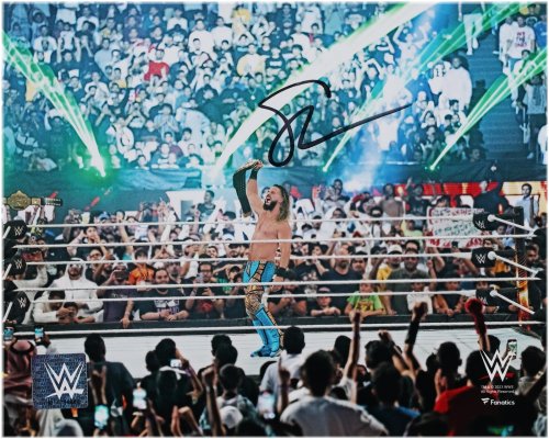 Champion's Triumph Autographed Photo